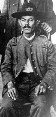 "Gral. Benajamín Argumedo" en una silla, retrato